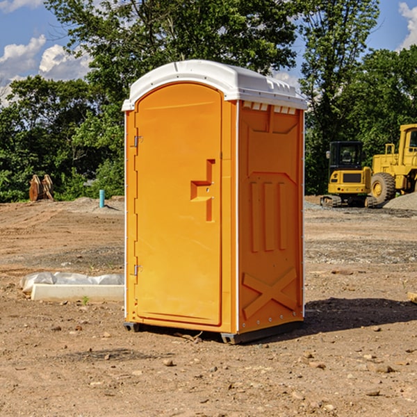 how often are the portable restrooms cleaned and serviced during a rental period in Mena